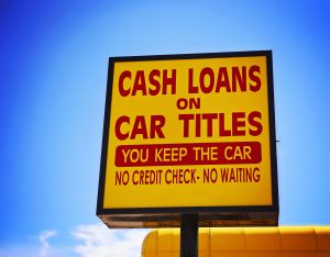 a cash loan or car title loan sign in the summer time toned with a retro vintage instagram filter app or action effect