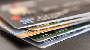 Are you up to your ears in high-rate credit card debt? Don't worry; there is a way out! Here are 7 smart tips for getting out of credit card debt fast. Does the thought of checking out your credit score make you want to scream? Credit cards are a great way to lessen that anxiety. Like all good things though, as quick as it can help, it can also destroy if you don't pay on them. Once you pile on the credit card debt, it can be a challenge to get out. Don't let this discourage you. There are a few ways to save yourself from drowning in numbers. Here are a few tips on getting rid of credit card debt and claiming your life back. 1. Stop Using Your Card If you know for a fact that you have terrible spending habits, hide your card from yourself before you sink too far into the pit. You can cut it up, lock it in a safe and lose the code, package it in duct tape and bury it in the backyard, use a wood chipper, the options are endless as long as it is out of your hands. If you're using it to pay your bills then, try and set up a payment plan with your utility company. Or downgrade your house or car. Fitting your bills into your budget will make you less likely to use your credit card and give you a little breathing room for managing credit card debt. 2. Make a List of All Your Debt Studying your enemy is one of the key factors of defeating it. Tis means you should make a list of all the credit card debt you've currently got under your belt. Making a list will help you figure out which one you should prioritize and pay off first. How do you determine this? Check out the standing of all the existing credit card debt you have and their interest rates. 3. Come up with a Strategy Credit cards can do massive damage to your credit score so you want to pay the one with the highest interest off first. After you've paid off that one, go on to the next one. Eventually, you will pay them all off as you go down the line. Make sure you continue making minimum payments on them after so you don't find yourself drowning again. 4. Try to Get a Lower Interest Rate Not all credit card companies will be agreeable about giving you a lower interest rate, but it never hurts to try for the sake of getting lower payments. Sharpen up your negotiation skills by using any kind of leverage you can to get them to work with you. Bringing up how long you've been with them or your good standing up to this point might get them to budge a bit in your favor. If they are completely unagreeable, then transferring your debt to a new, lower-rate card might be an option, or you can take out a personal loan. Personal loans can be a little harder to get, but you'll find that if you can get one to pay off your debt, the interest rate is usually way lower than your credit card one. Eventually, the loan will replace your credit card debt with an installment loan. Believe it or not, this will actually look better on your credit. To find out more on personal loans you can visit this website. 5. Find a Payment Plan If getting a lower interest rate still doesn't work out for you, then it's time to figure out some other options. The easiest thing you can do is either ask for a deferment or a new payment plan. Credit card companies like money, so they will most likely work with you on this so they don't have a non-paying account in their system. 6. Limit that Spending If you limit your spending, you'll have more money to put toward your credit cards each month. Just think: skipping out on that morning coffee could allow you to pay your debt faster and lower your interest rate. If you want to make a little game out of it you can join spending challenges. This could mean going on a 14-day to a year-long spending ban depending on what's best for you. This is recommended if you just don't trust yourself to stay on budget. If you have self-control, then it's just a matter of keeping up with it and throwing these savings into your loan debt. 7. Put Any Extra Income Towards Credit Card Debt Budgeting can only take you so far so on top of putting any extra savings toward your debt. You can take on little odd jobs for extra money. There most likely a ton of options available for you in your area. You've just got to call around or surf the web to seek them out. Consider turning any kind of hobby into a money-making business. For example, if you know you're a great artist, then you can open yourself up to commissions. You might be surprised at how many people may pay. A Guide to Getting Rid of Credit Card Debt Just because you feel like you've dug your own grave, doesn't mean you have to stay that way. There are ways of getting rid of credit card debt. Come up with a foolproof plan to tackle it, try to find a lower interest rate, ask for a new payment plan, or just take on a few extra odd jobs. Put your credit cards back in your control. If you're new to the credit card world, you could make a lot of mistakes that will put you into debt without even realizing it. Visit our blog for a beginner's guide to credit cards